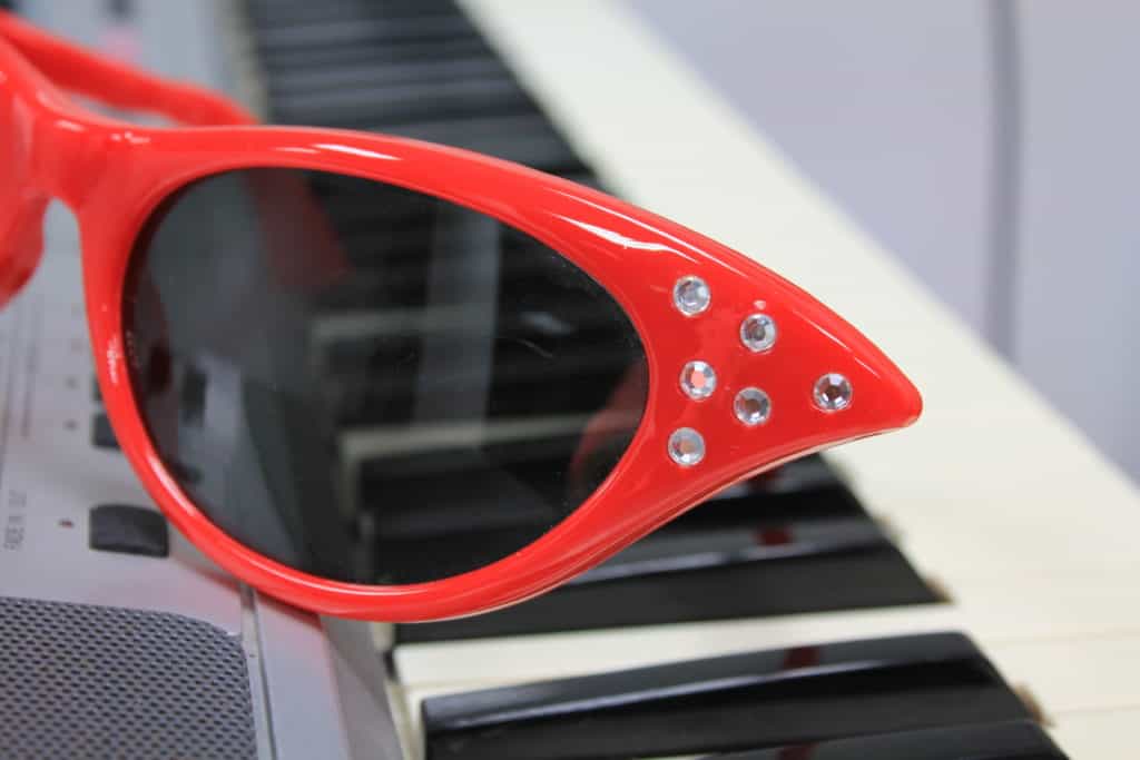 sunglasses on a piano